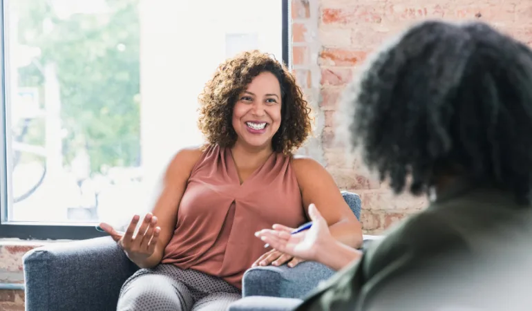 ADHD Therapy - woman in chair with therapist