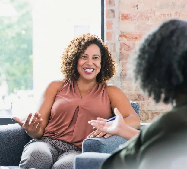 ADHD Therapy - woman in chair with therapist