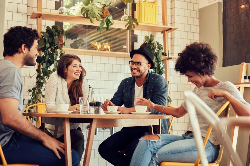 friends connecting socially and boosting serotonin through meeting in person