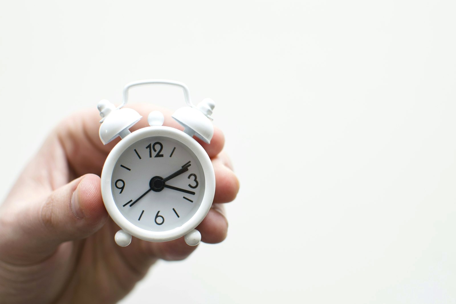 Analog clock on a table marking the short window of a panic attack peak.
